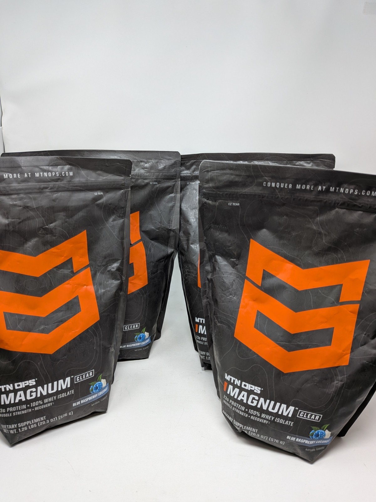 MTN OPS Magnum Clear Protein Powder Blue Raspberry Coconut 1.26 Lbs Lot Of 4