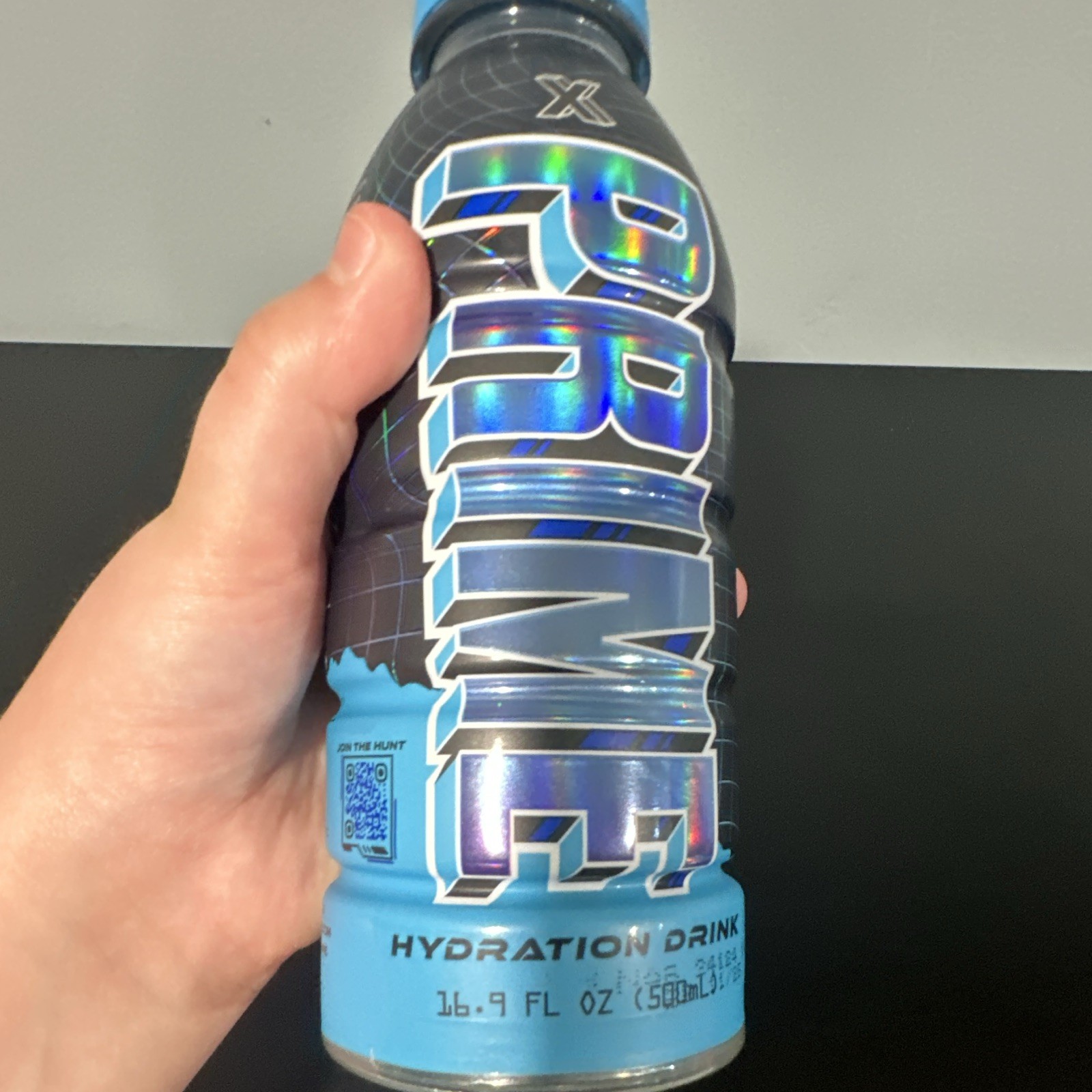 PRIME Hydration Electrolyte Drink X treasure hunt blue holo 16.9 fl oz (expired)