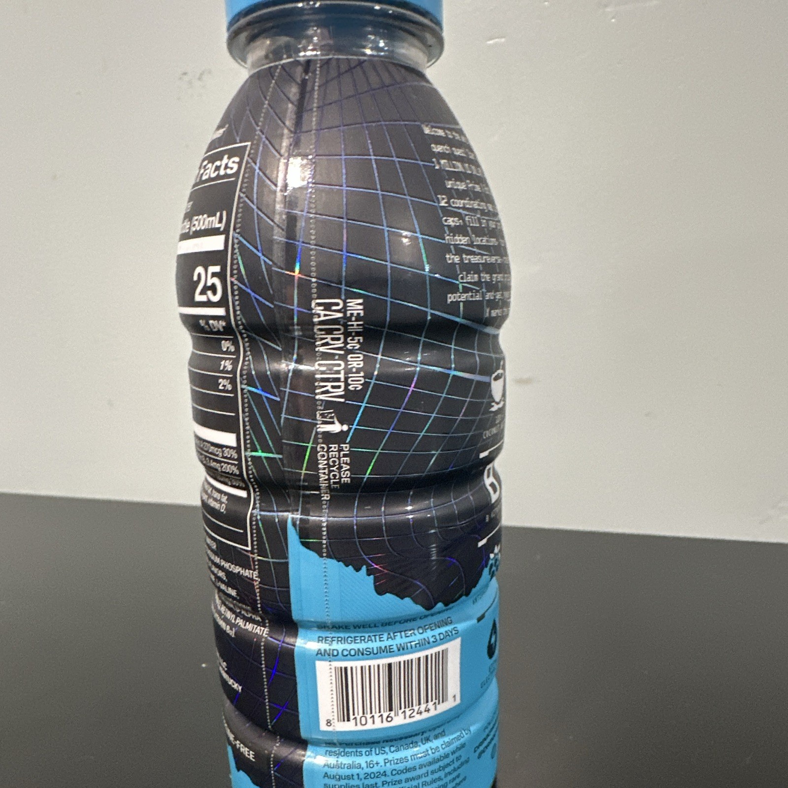 PRIME Hydration Electrolyte Drink X treasure hunt blue holo 16.9 fl oz (expired)
